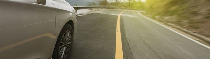 Car and rural road