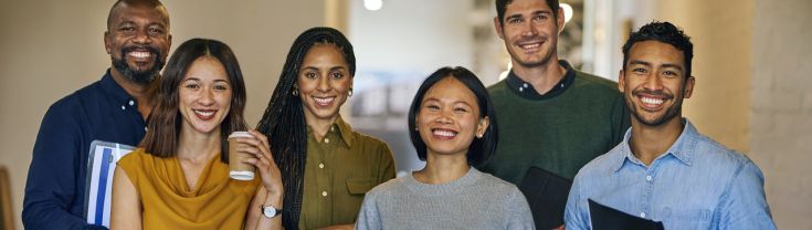 Portrait of diverse group of cheerful entrepreneurs