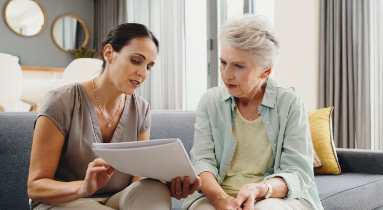 Senior lady and woman planning a will